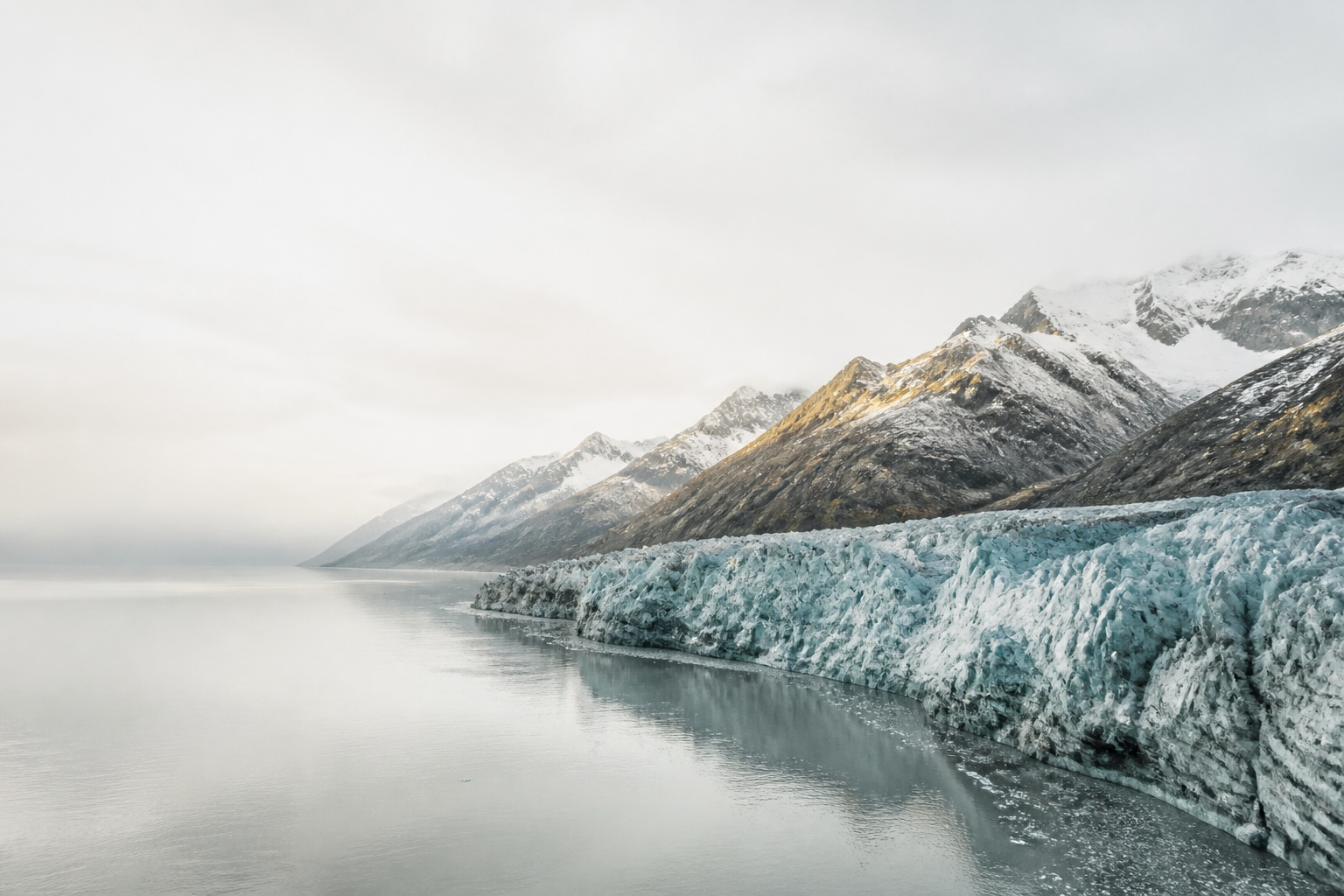 Wide quiet Alaska glacier conveying the scale and silence of the landscape